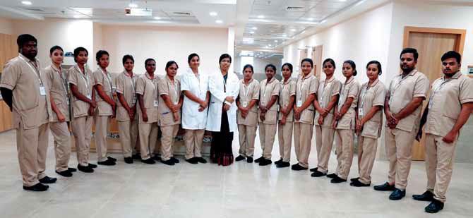 Jeslin Snekha Prabha (centre), the nursing superintendent at SVICCAR, with her team