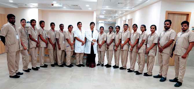 Jeslin Snekha Prabha (centre), the nursing superintendent at SVICCAR, with her team